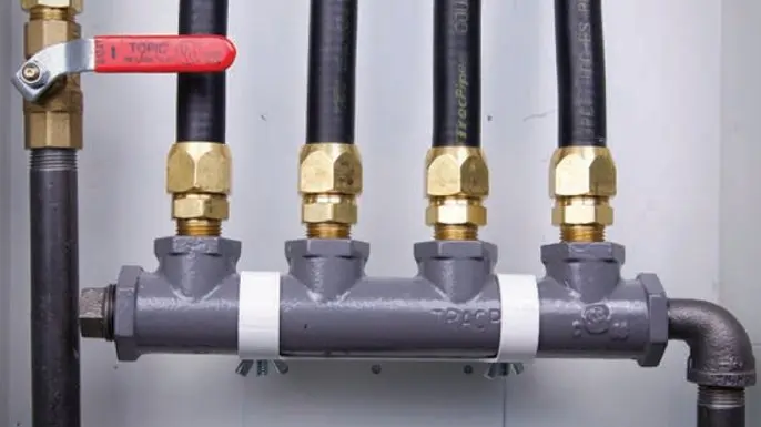 Gas line manifold installation with flexible piping and shut-off valve – Expert gas fitting service by HVAC Group in the GTA