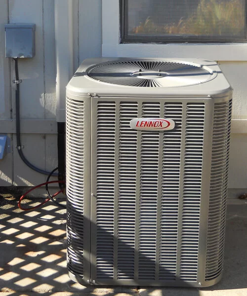 Lennox central air conditioner condenser unit installed beside a residential home in Mississauga
